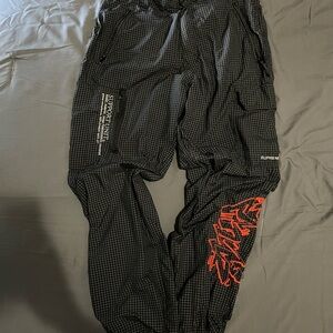 Supreme “Support Unit” Pants
Nylon/Rain Texture
Straps To Adjust On Waist